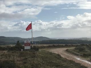 Red warning flag flying