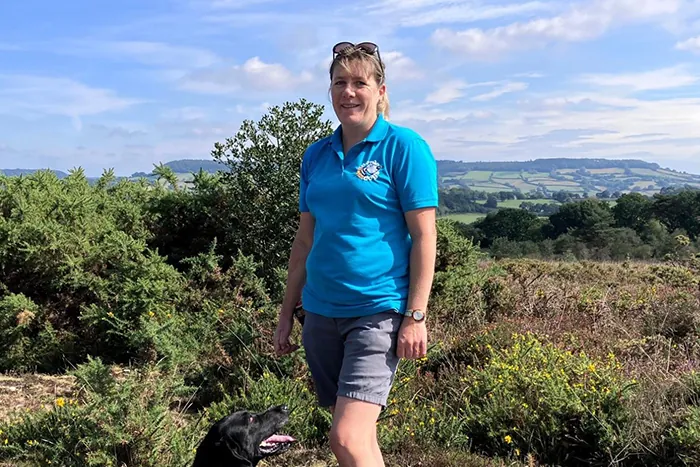 Julie and their dog Maisie on heaths